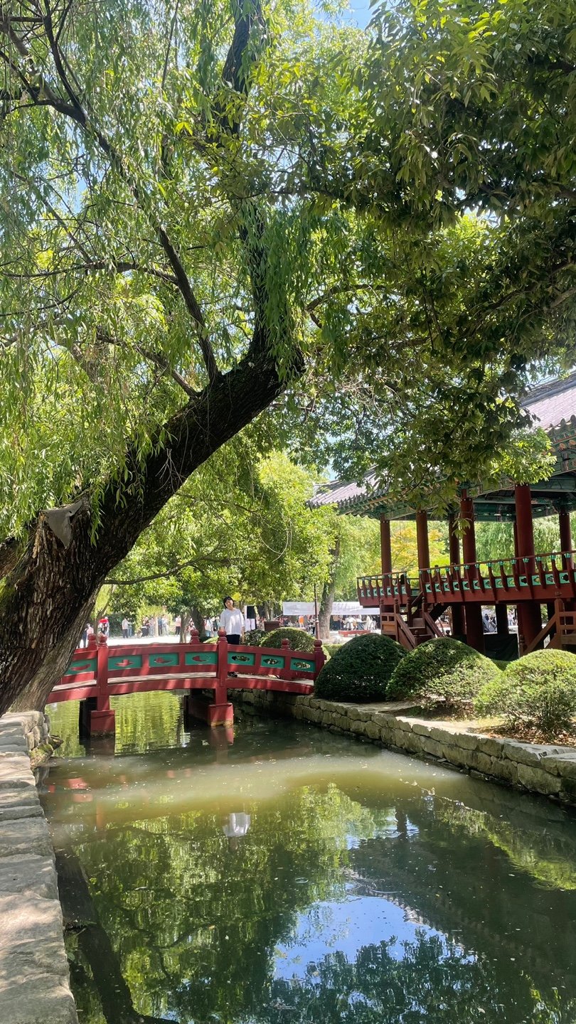 The red Ojakgyo bridge over the lotus pond at Gwanghalluwon Garden in Namwon, Korea