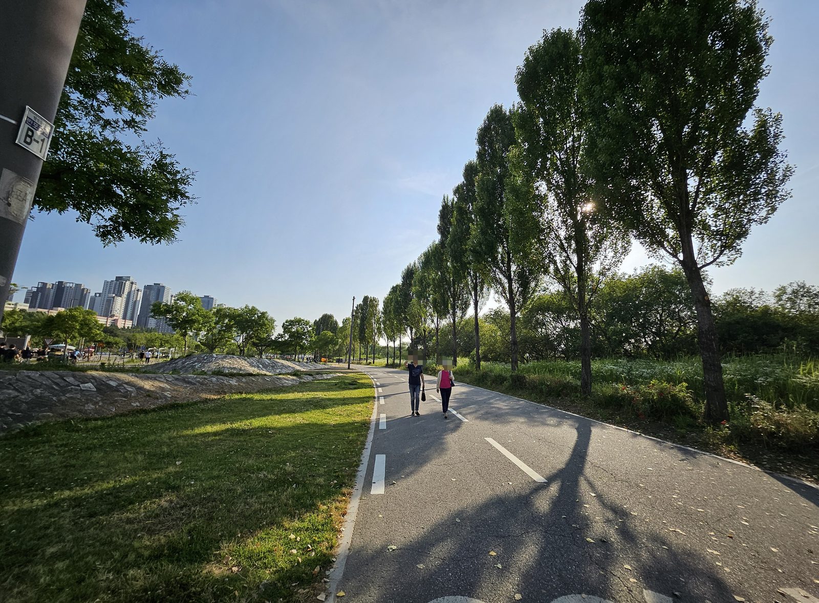 A riverside walking path along the Han River in Seoul