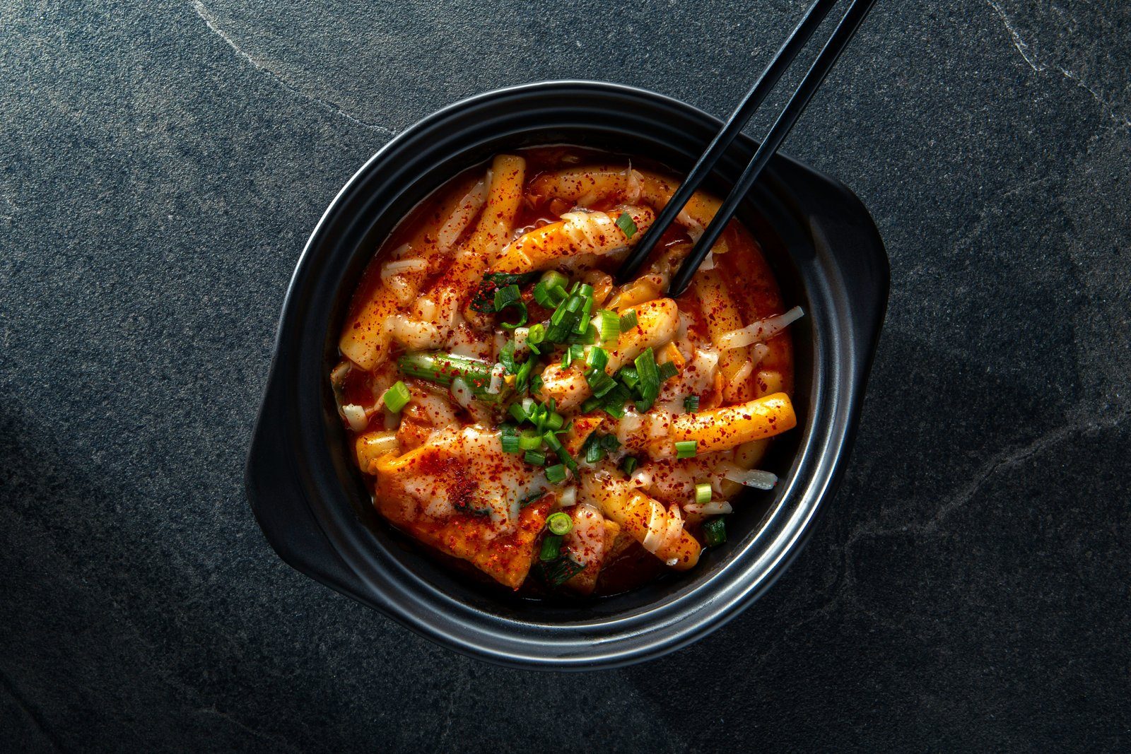 A bowl of tteokbokki — spicy Korean rice cakes