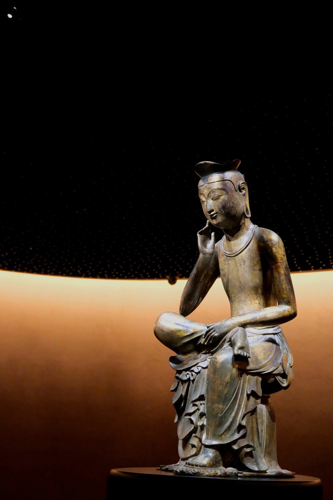 The gilt-bronze Pensive Bodhisattva in the Room of Quiet Contemplation at the National Museum of Korea